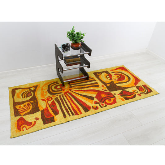 Full view of authentic 1960s abstract tapestry displayed as floor runner in a Mid-Century Modern styled room