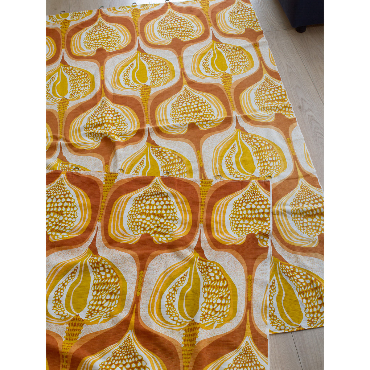 Retro orange and yellow vintage fabric panels from 1970s, laid flat, great for sewing projects