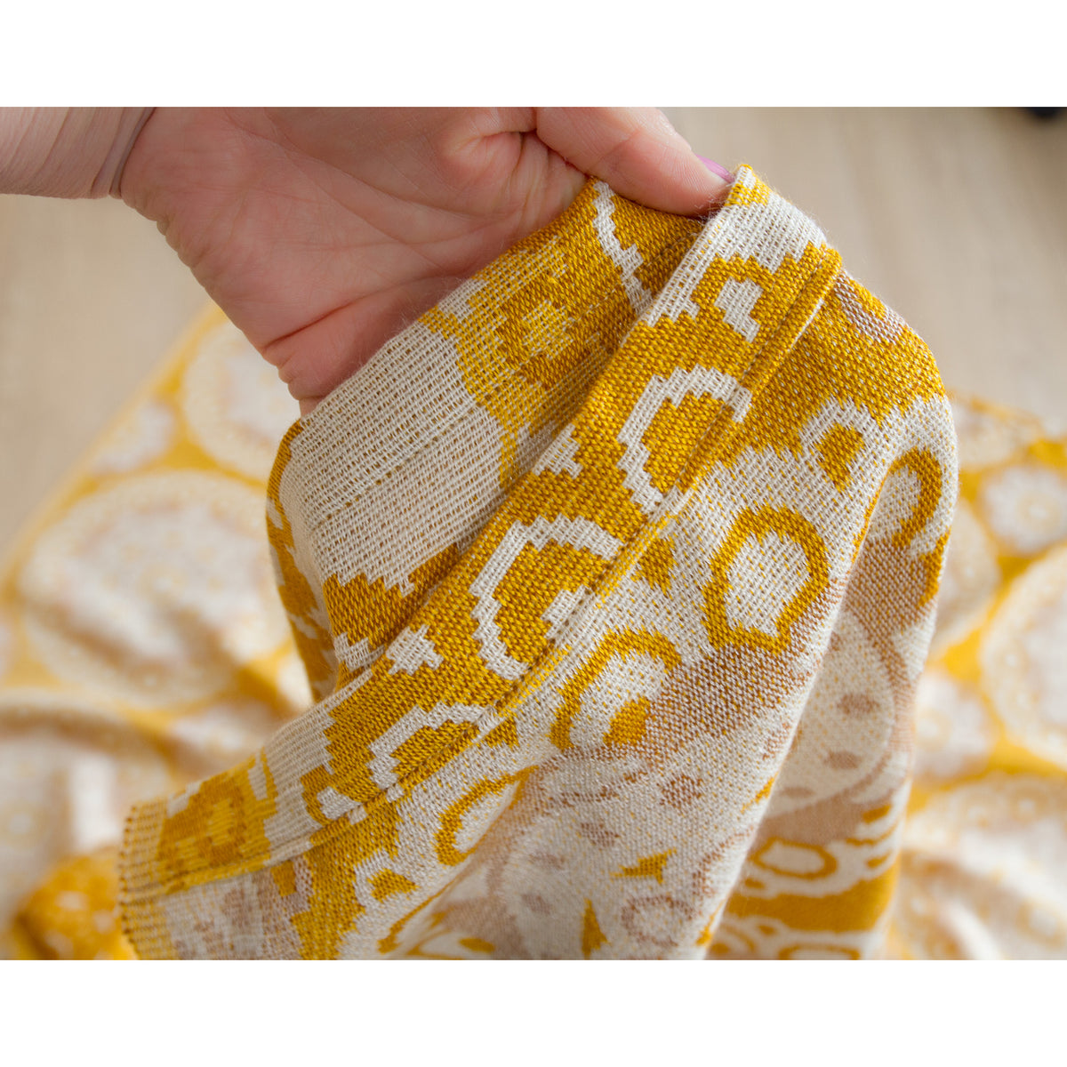 Hem detail of 70s yellow vintage woven curtain panel, neatly finished seam