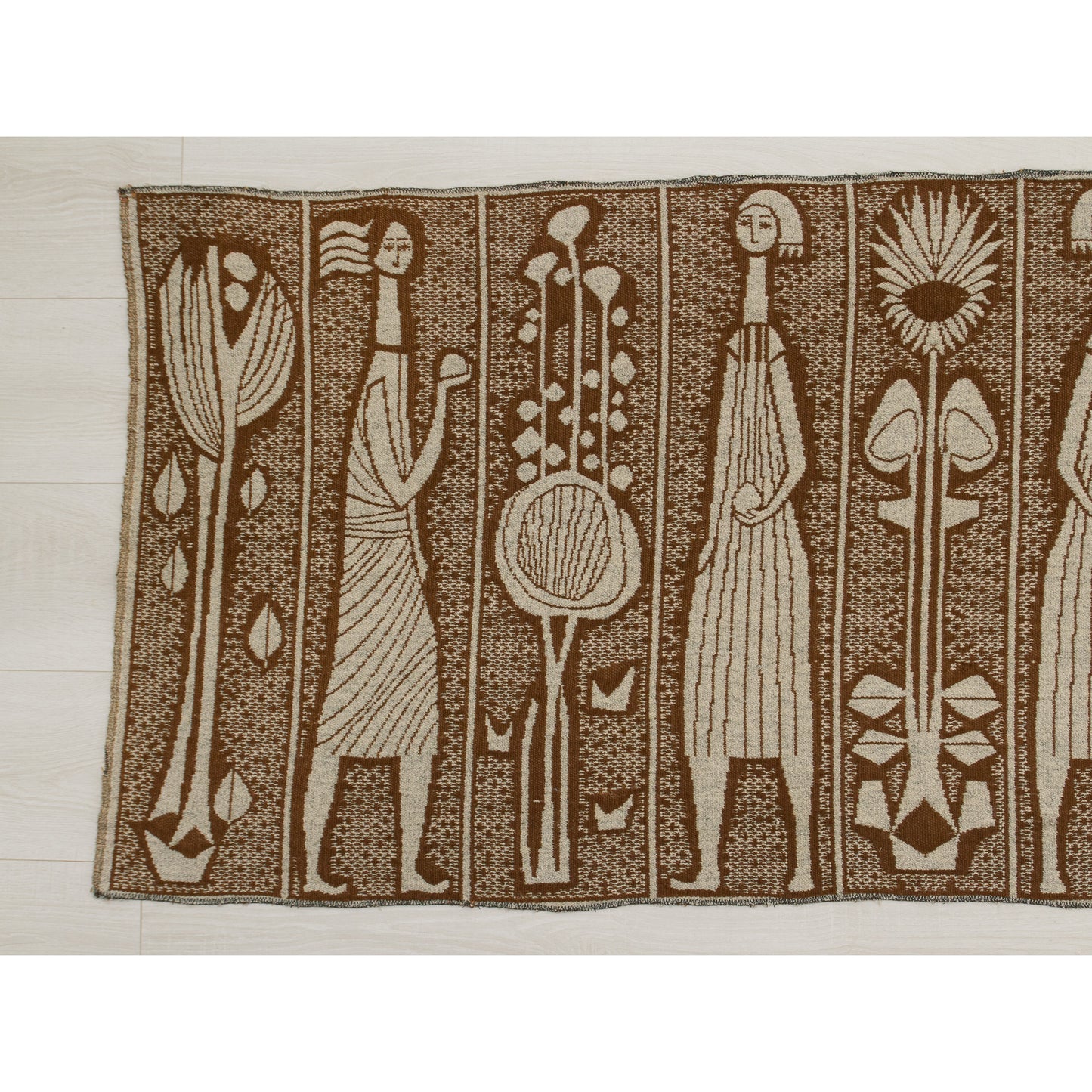 The left side of the tapestry displayed horizontally. The large size makes it an ideal noise-dampening wall hanging for empty rooms.