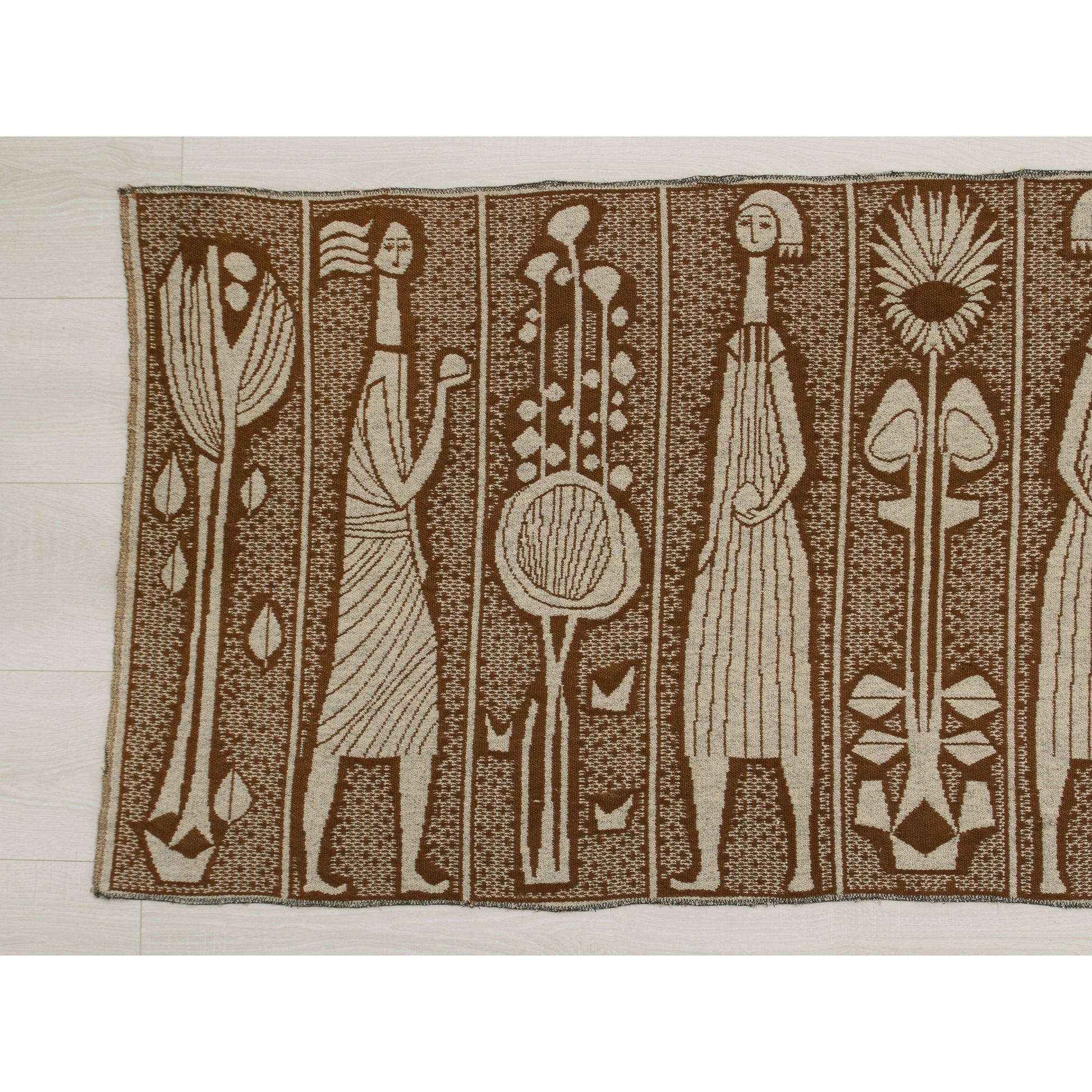 The left side of the tapestry displayed horizontally. The large size makes it an ideal noise-dampening wall hanging for empty rooms.