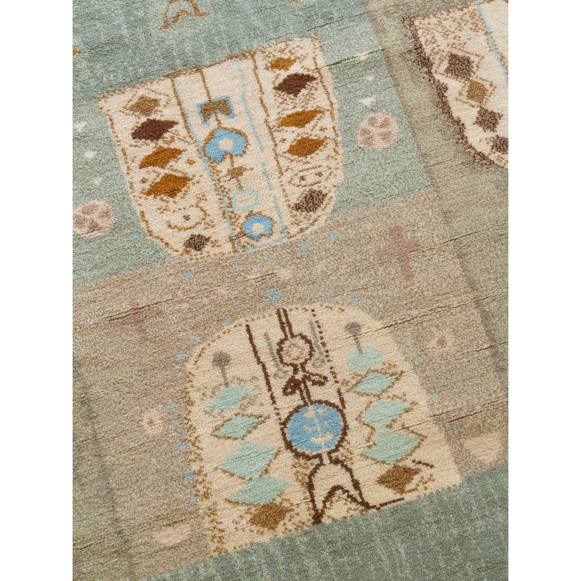 Close-up detail of the very center motif of the "Peasant Baroque" tapestry. Shows the astonishing, painting-like precision only achievable through fine hand-knotting.