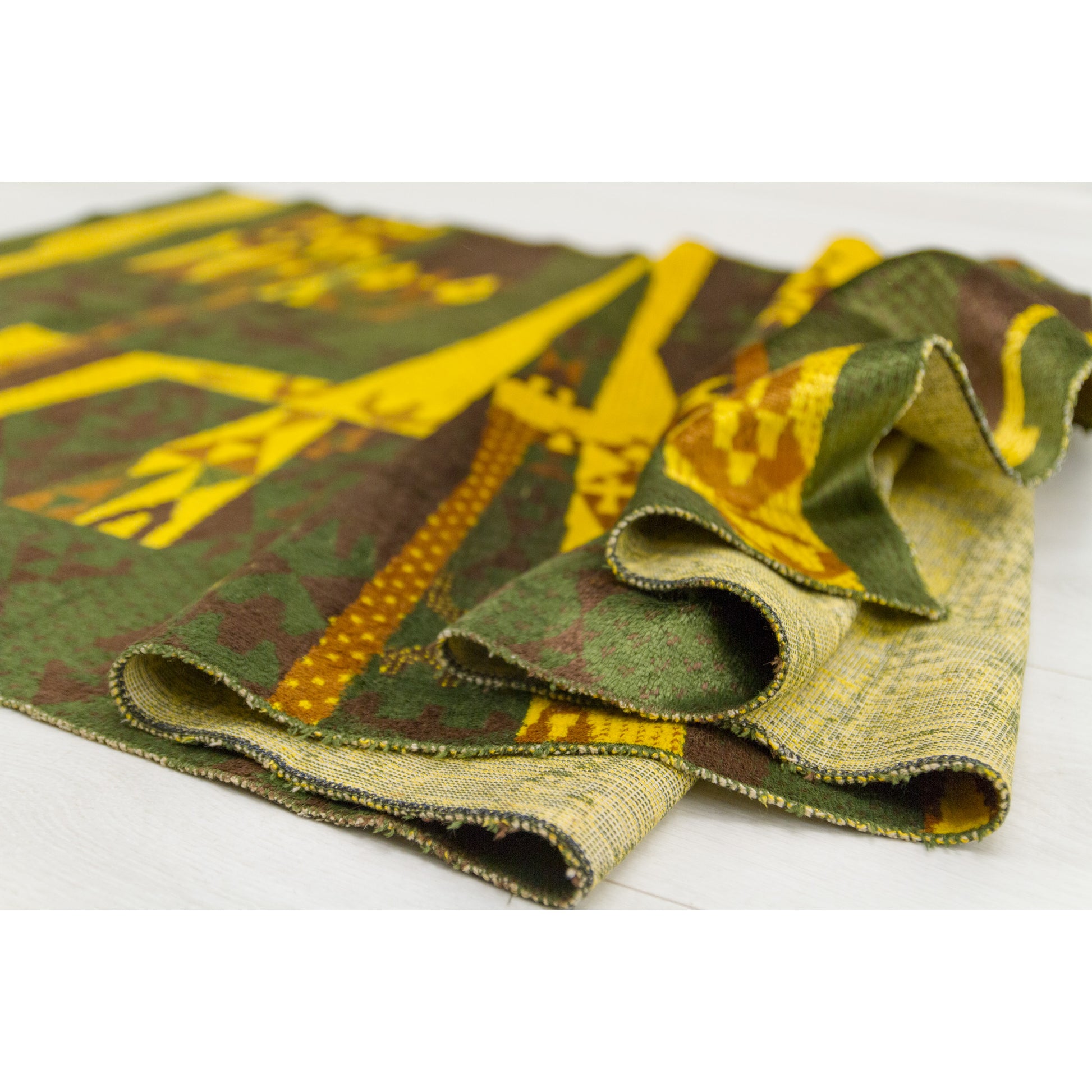 Edge detail showing the pristine condition of the textile. The vivid colors show zero fading, preserving the original electric 1960s hue.