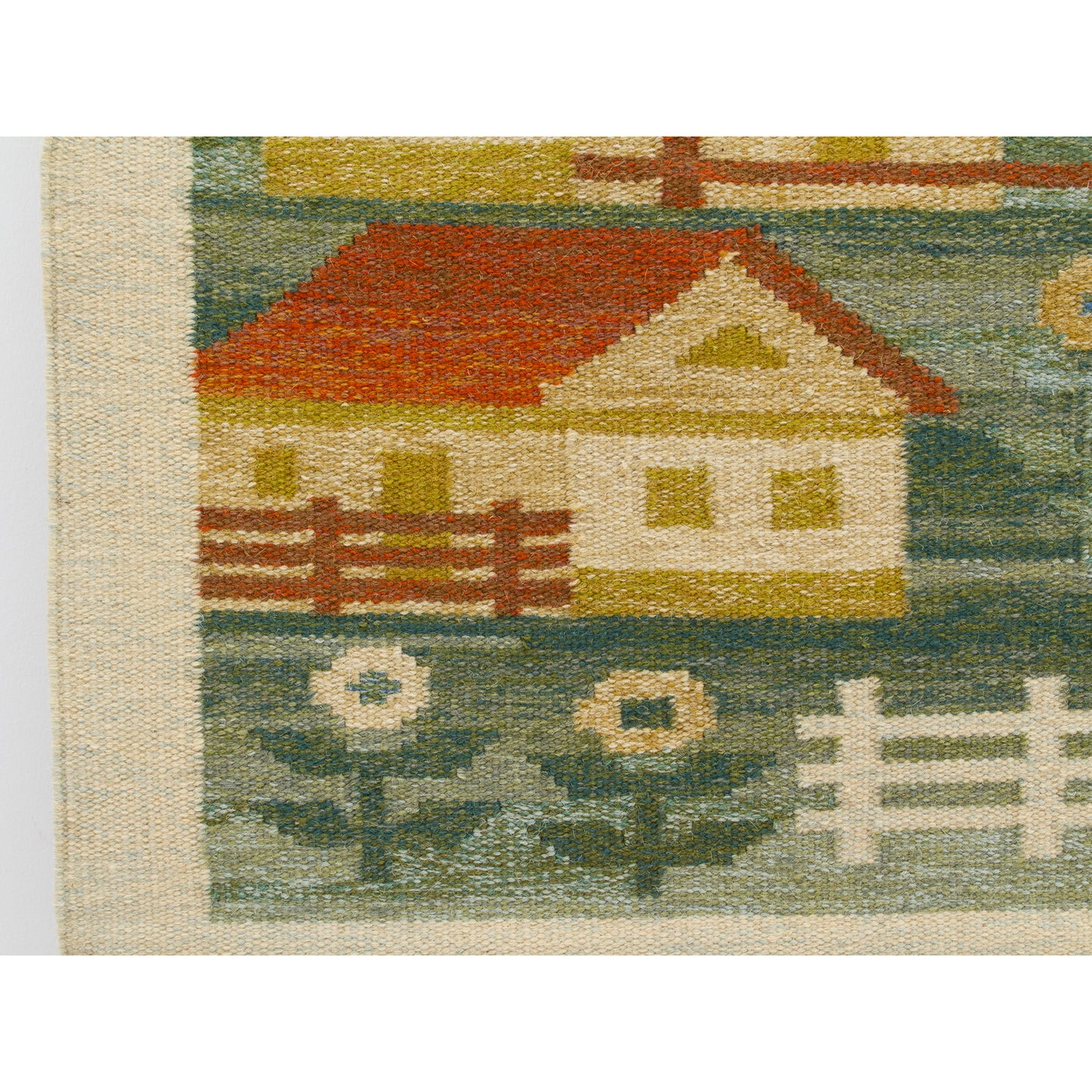 Extreme close up revealing intricate mid-century geometric weaving of tiny stylized flowers, a classic rural fence, and a sweet little house.