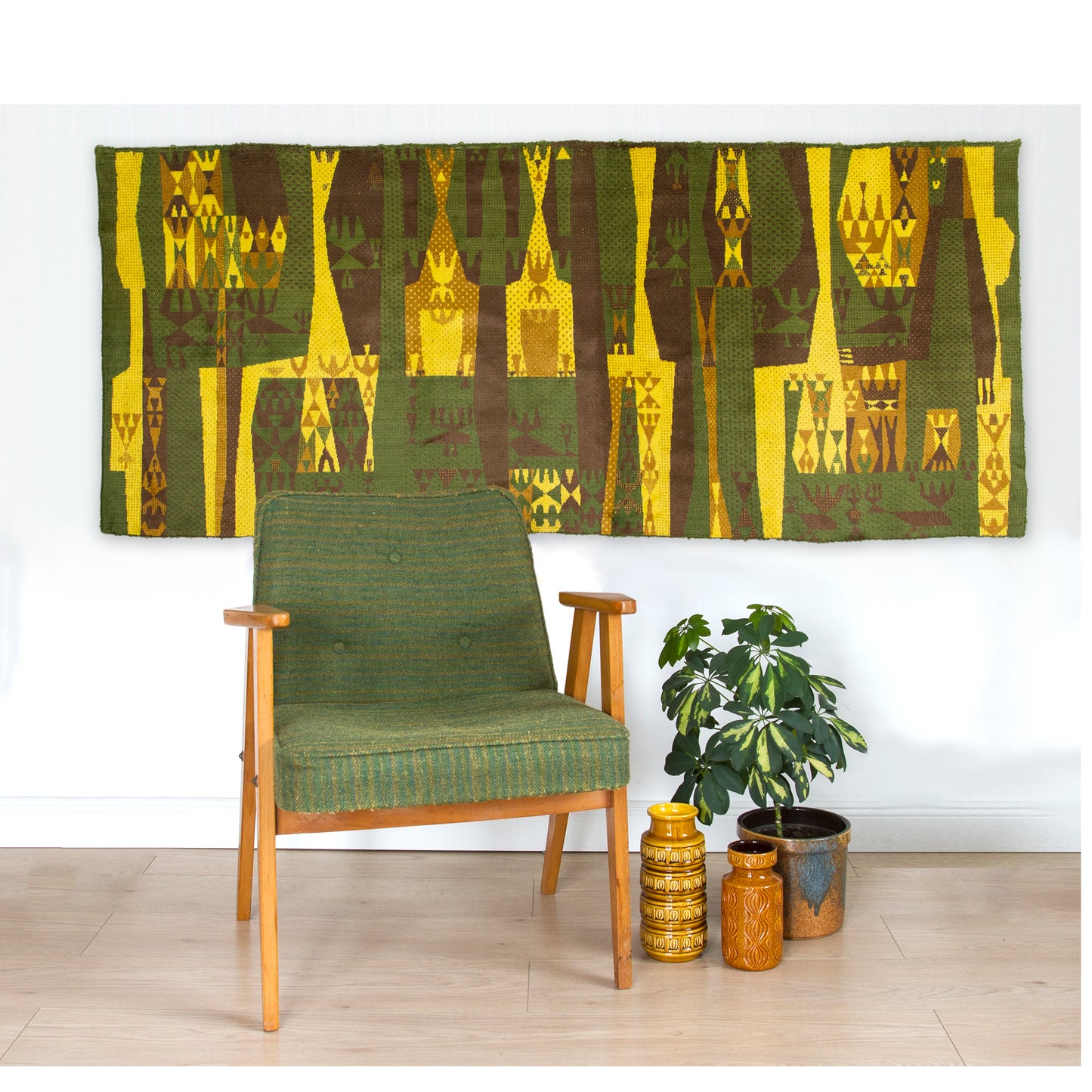 An explosion of color for the home: vivid yellow and moss green tapestry in a retro room setting. Authentic Hungarian "Emese" style design that embodies the playful, happy aesthetic of the Space Age era.