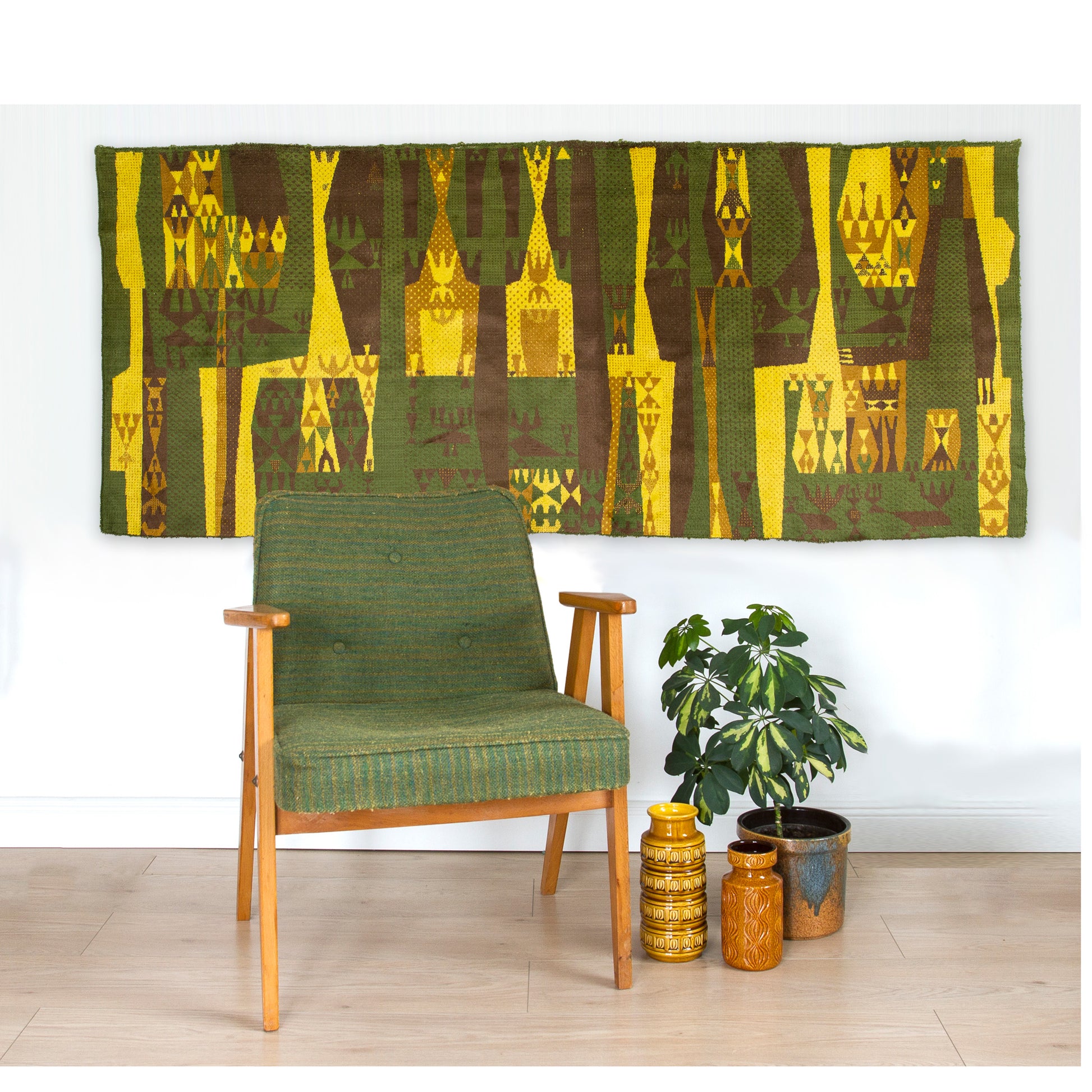 An explosion of color for the home: vivid yellow and moss green tapestry in a retro room setting. Authentic Hungarian "Emese" style design that embodies the playful, happy aesthetic of the Space Age era.
