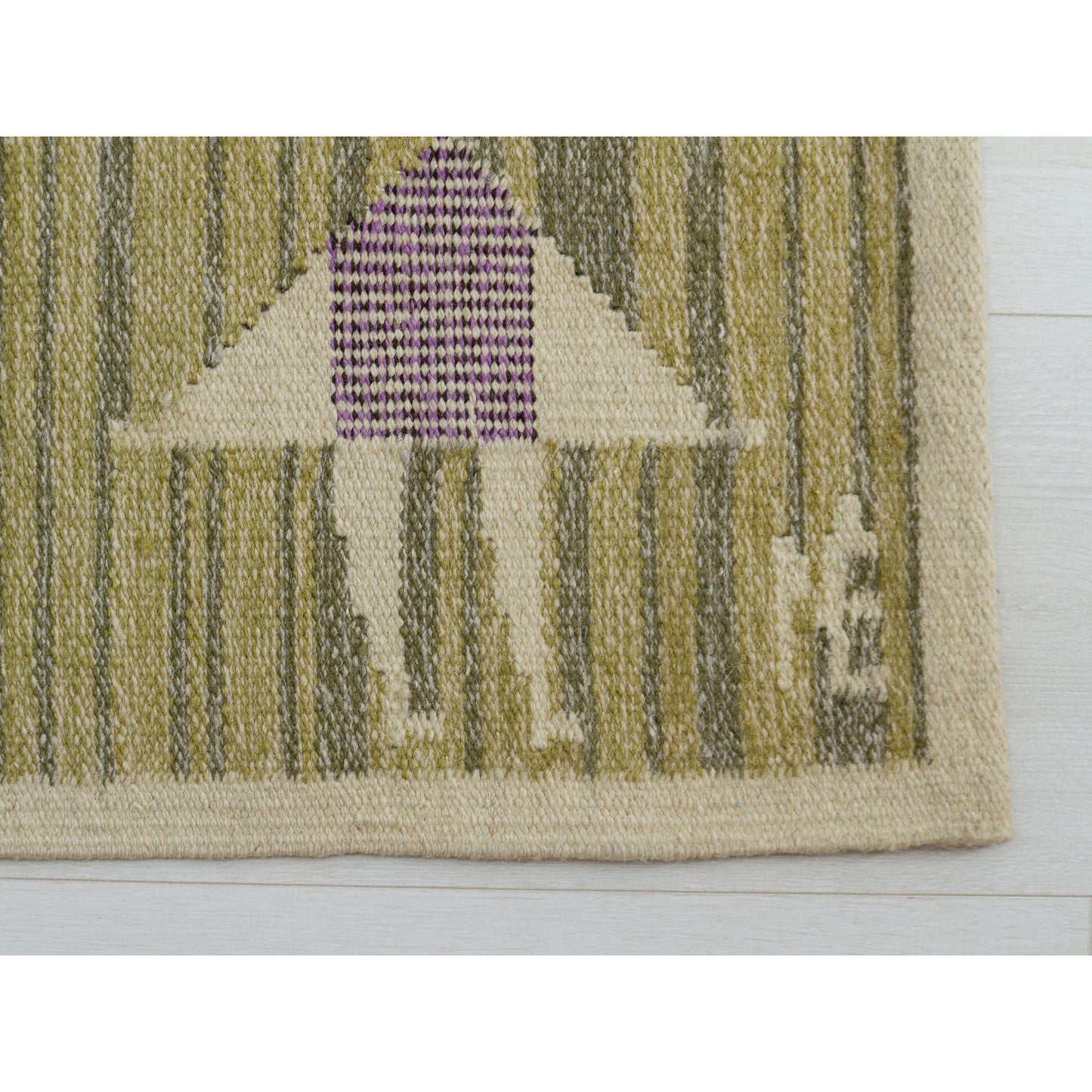 Extreme macro close up showing the original woven NÉ letters in the corner, authenticating the piece as genuine Eva Nemeth textile art.