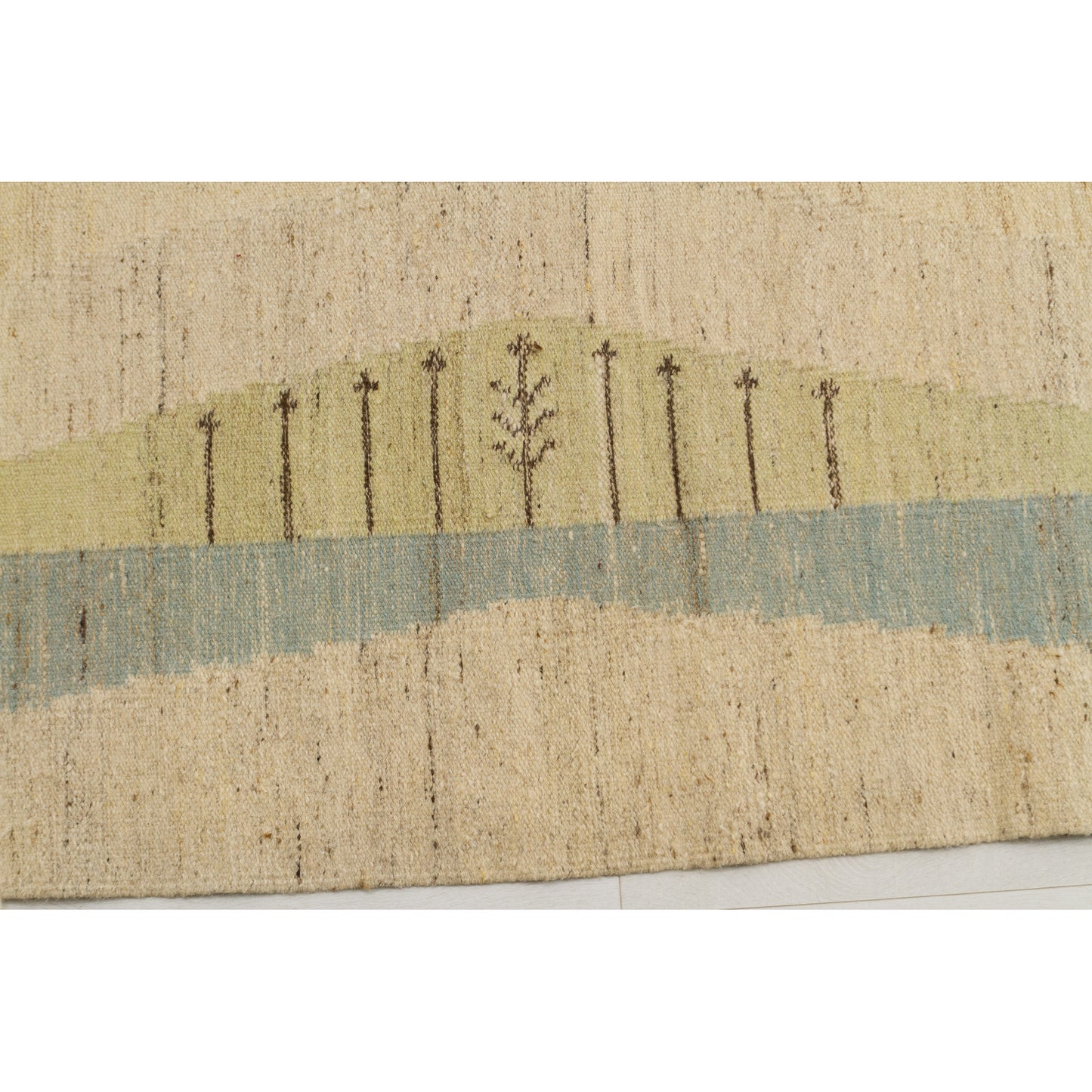 Macro texture shot of the handwoven wool. Calm wavy lines in soft pastel blue and green representing abstract mid century modern natural landscapes.