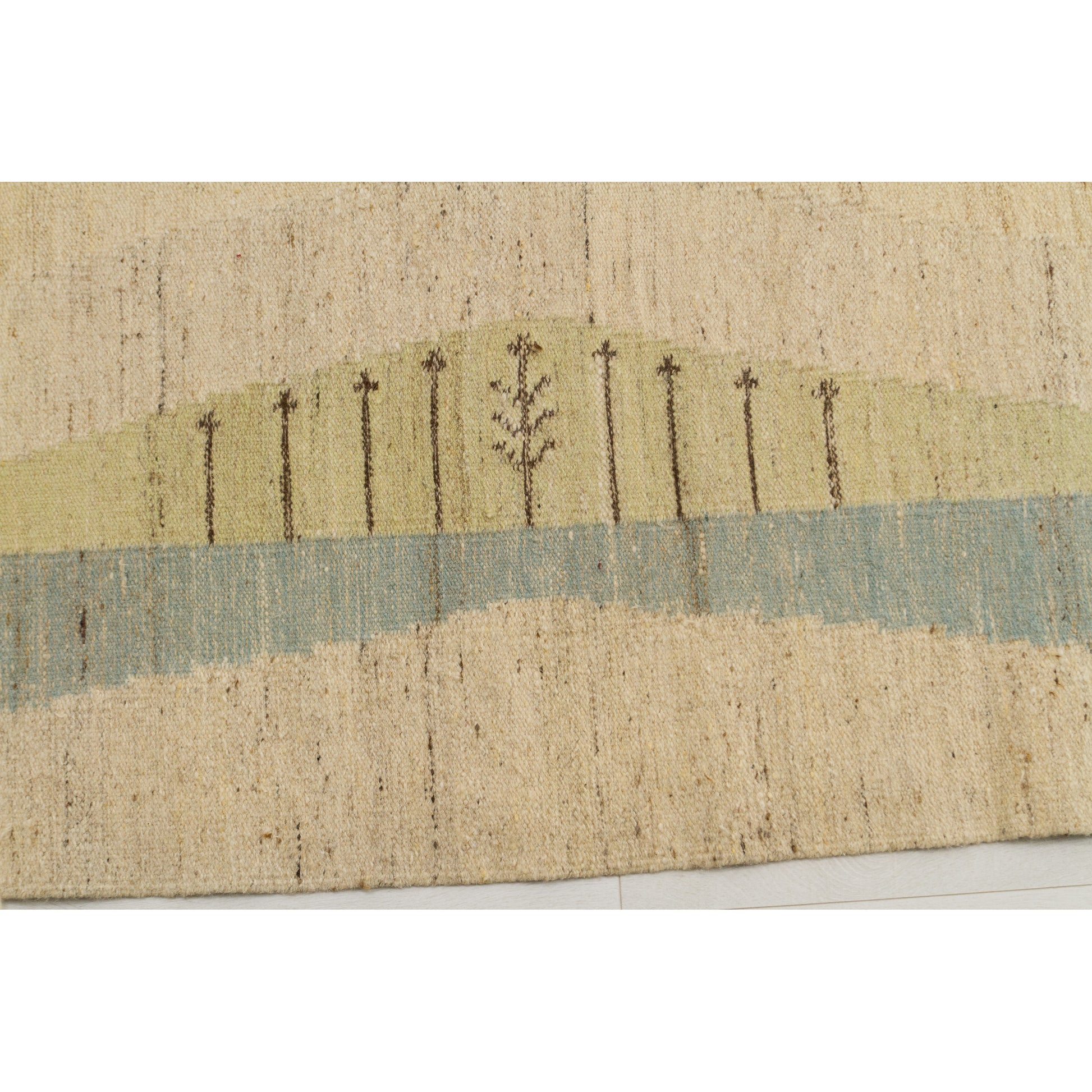 Macro texture shot of the handwoven wool. Calm wavy lines in soft pastel blue and green representing abstract mid century modern natural landscapes.