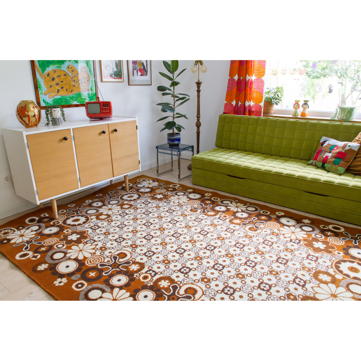 Groovy 70s area rug in a colorful maximalist living room with retro curtain and eclectic gallery wall