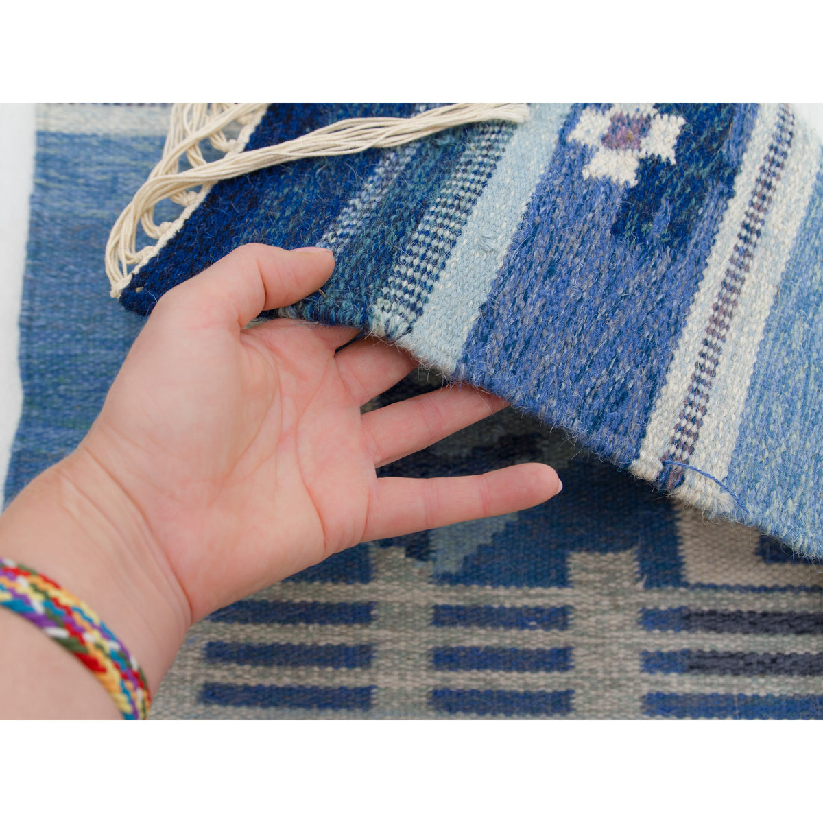 Angled view showing the straight, tidy selvage edges and the high-quality craftsmanship of Hungarian Cottage Industry.