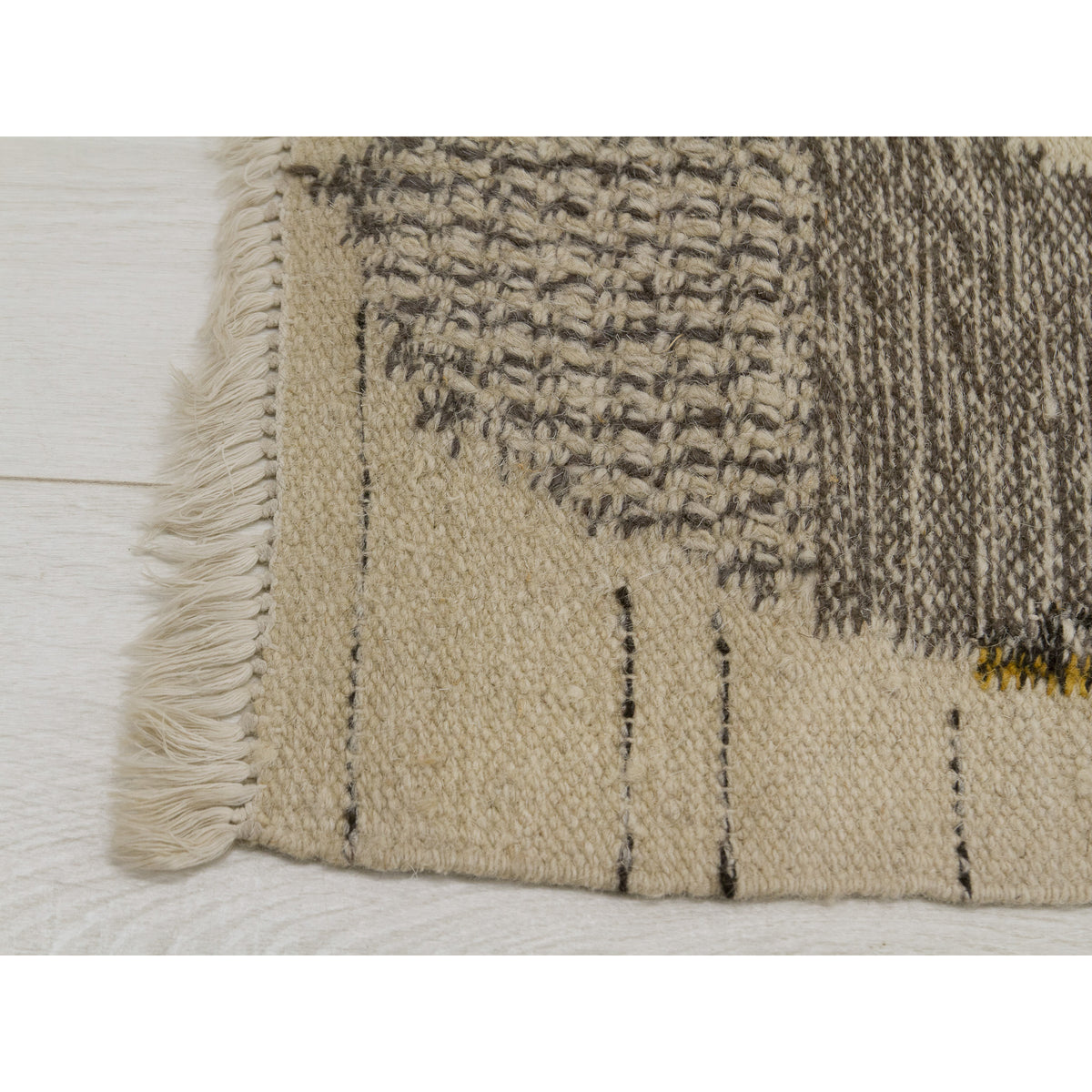 Corner and fringe detail of the flatweave, showing the excellent quality of the vintage weave.