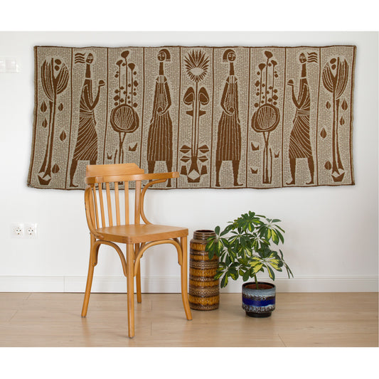 The vintage tapestry shown next to a Thonet bentwood chair to provide size reference. A substantial piece of woven wall art for large walls.