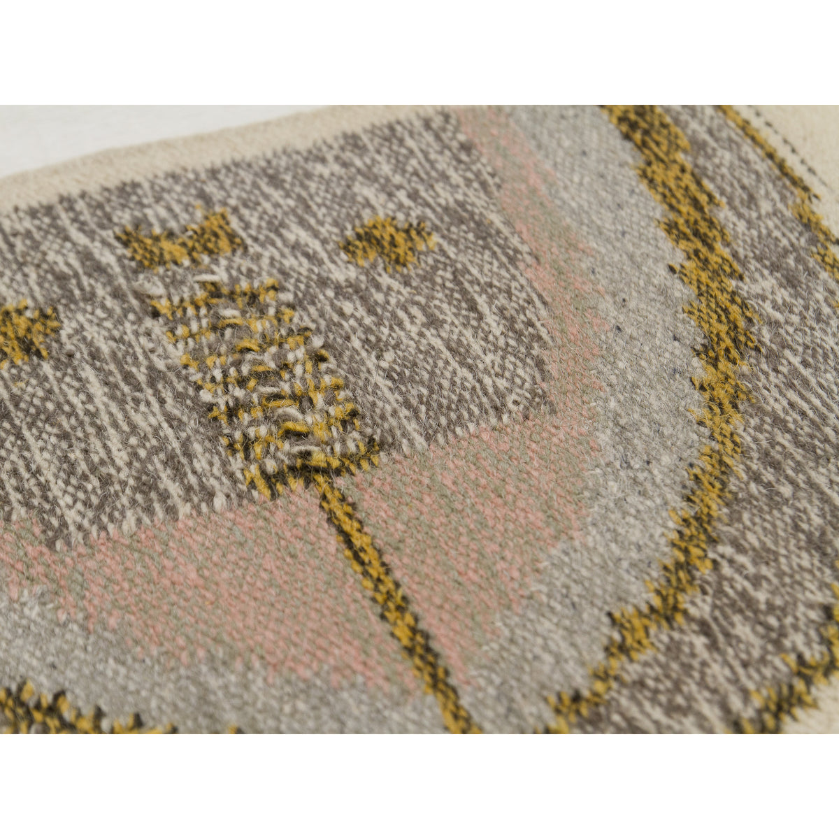 An angled close-up of the woven surface texture. The interplay of the nubby wool yarns creates a soft, tactile relief, emphasizing the craftsmanship of this original handwoven mid-century modern art piece.