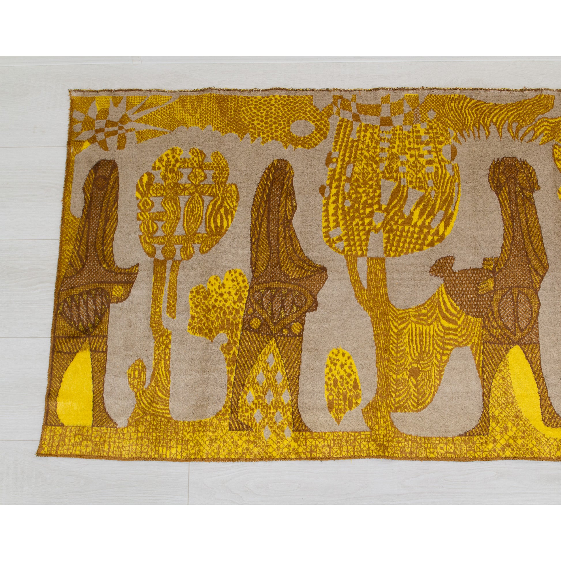 Left half of the vintage moquette tapestry featuring distinct elongated folk-art figures holding symbolic natural elements amongst stylized geometric mid century trees.
