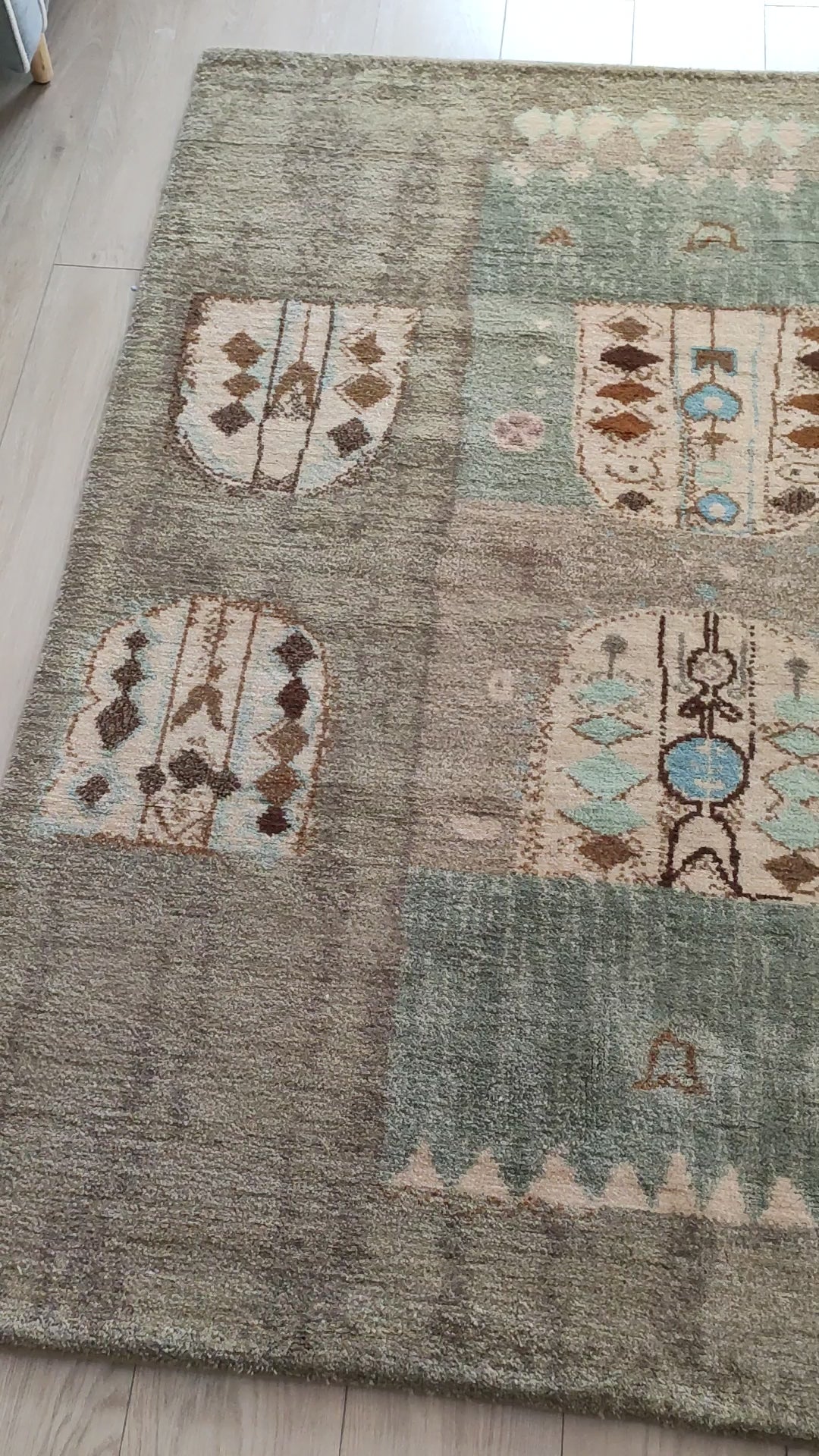 Short video of the large mid century tapestry laid flat on the floor. This 16-pound vintage handknotted rug demonstrates incredibly detailed, skilled craftsmanship, acting as a thick textile painting.
