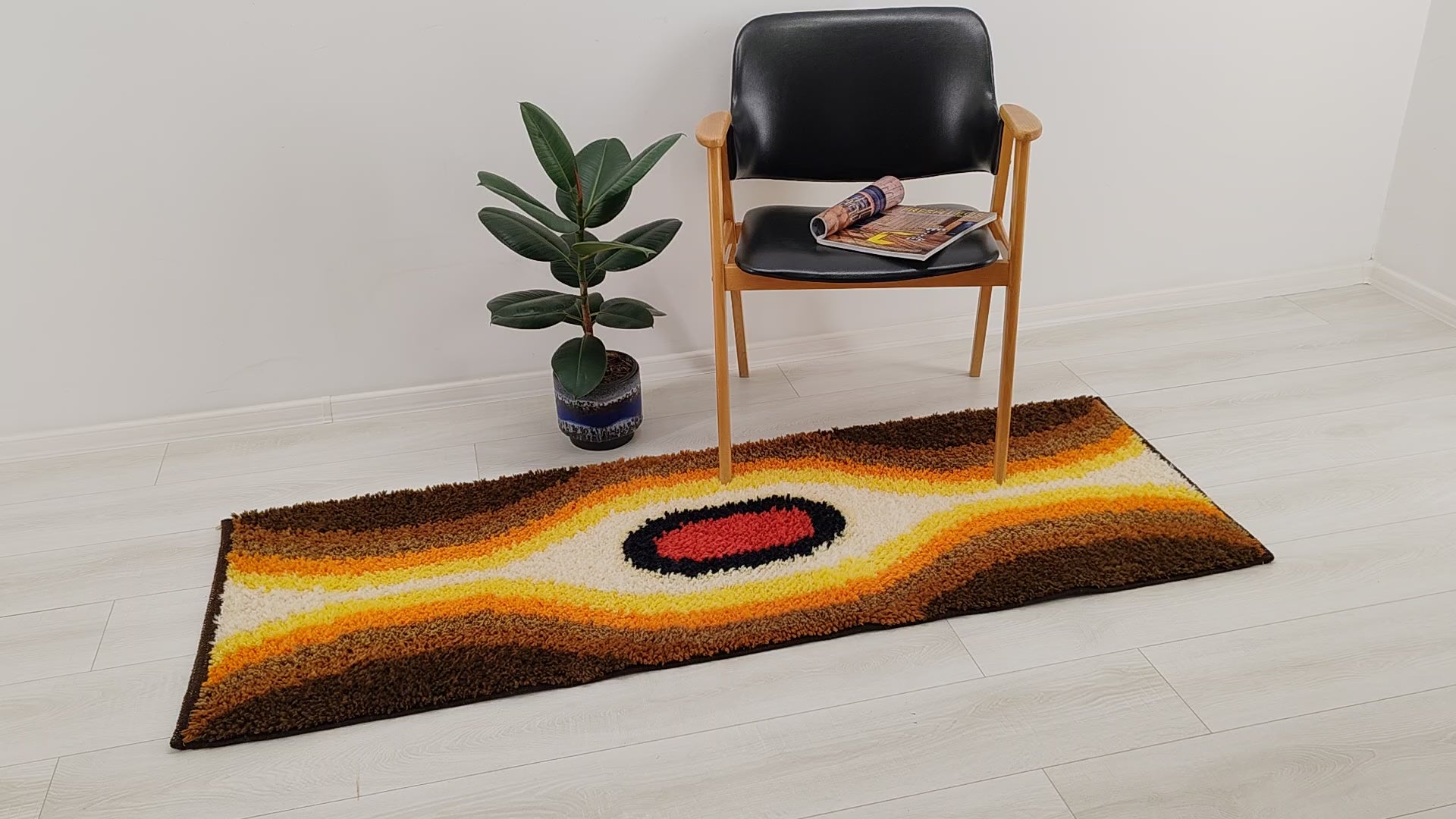 Smooth video pan of the multi-purpose vintage shag rug, demonstrating its tactile soft pile surface and the heavy duty woven backing.