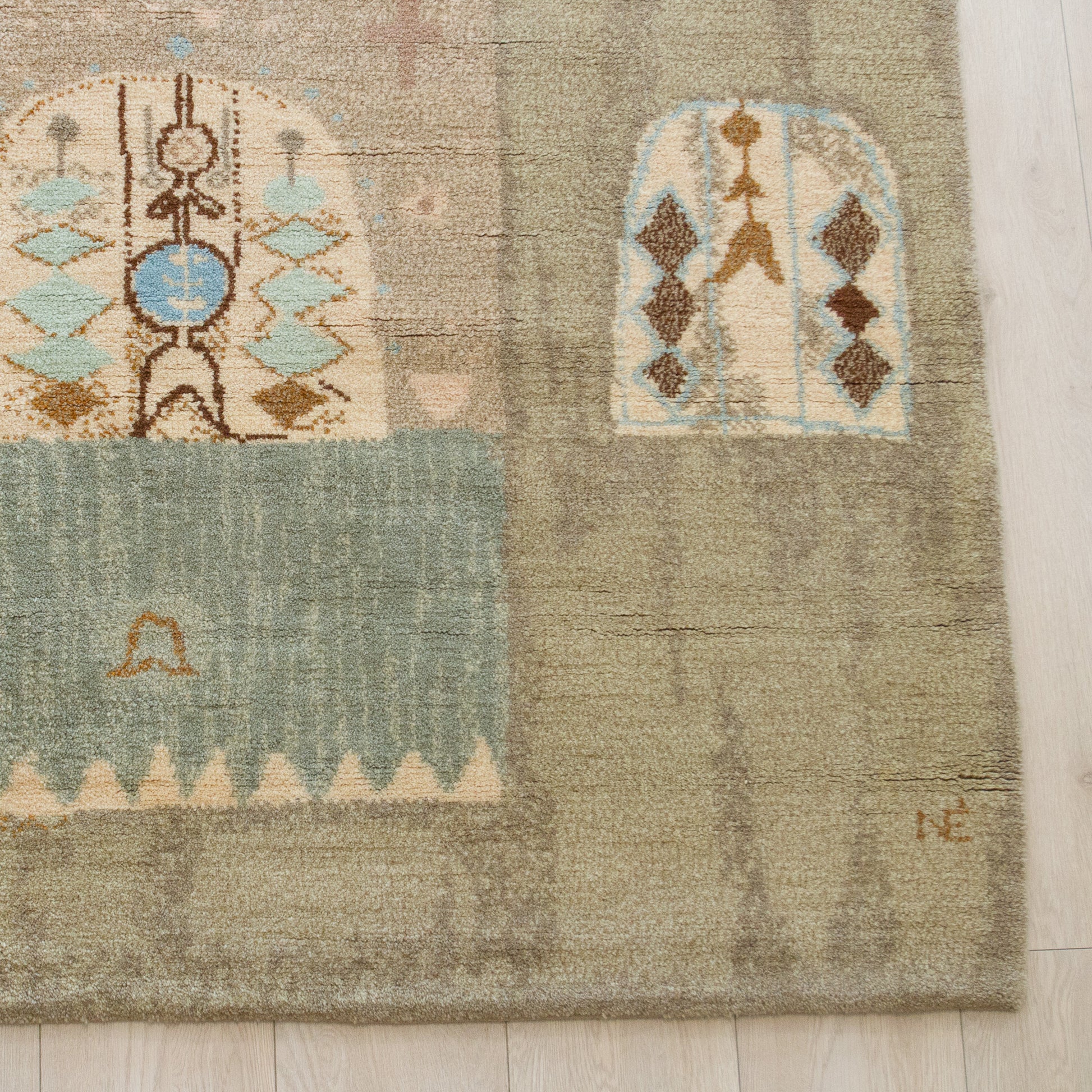 Bottom right quarter highlighting the incredibly detailed knots forming abstract window-like designs on this large Scandinavian style mid-century rug. Timeless, high quality wall art.