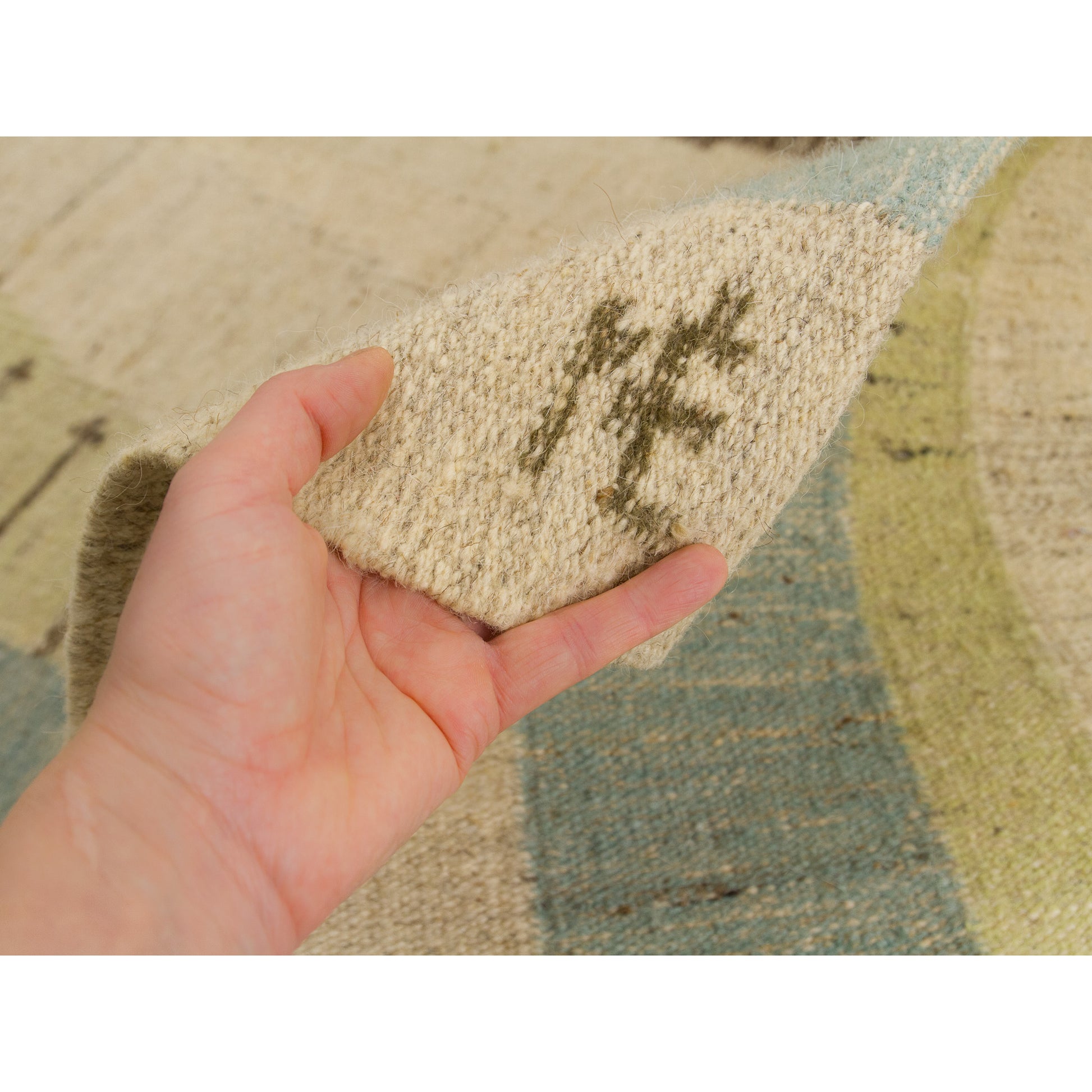 The iconic 'NE' woven monogram found in the bottom right corner of the tapestry, verifying this as an authentic signed piece by highly collected textile artist Eva Nemeth.