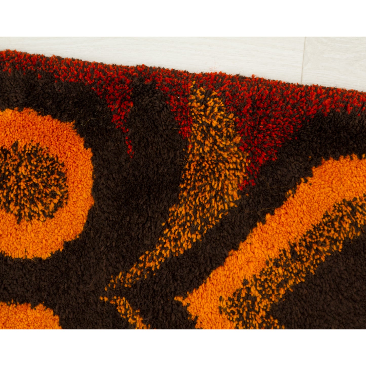 Extreme macro close-up showcasing the dense, uniform, velvety shag pile blending cotton and synthetic yarns into a stunning plush surface.