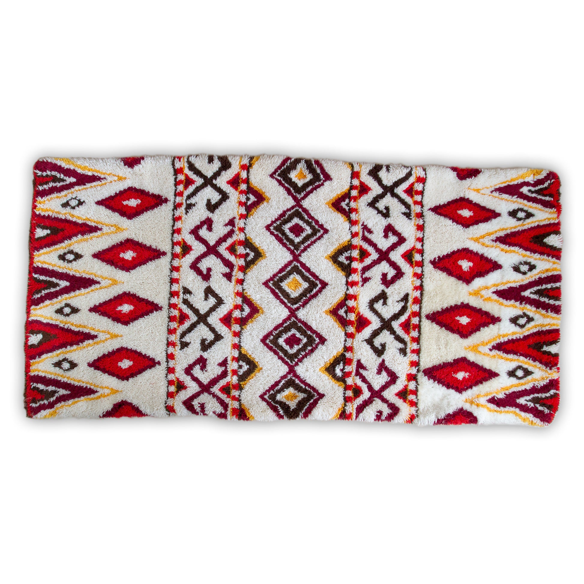 Full horizontal top-down view of the tribal patterned latch hook tapestry isolated entirely on a white background. Perfectly proportioned, bright, and symmetrical.