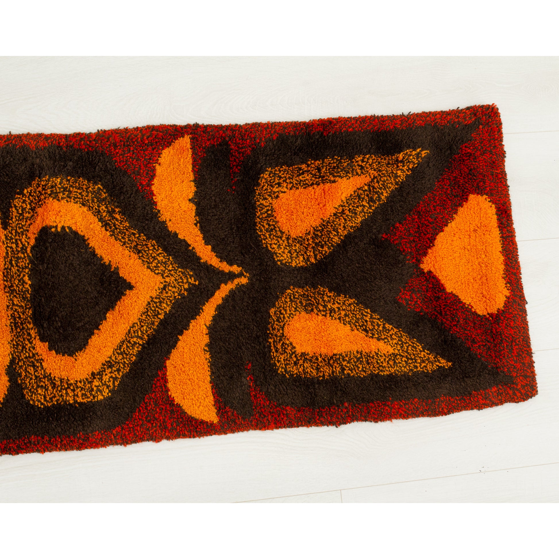 Right half of the vintage tapestry showing immaculate time-capsule condition. Zero fade in the vivid red, brown, and golden orange yarns.