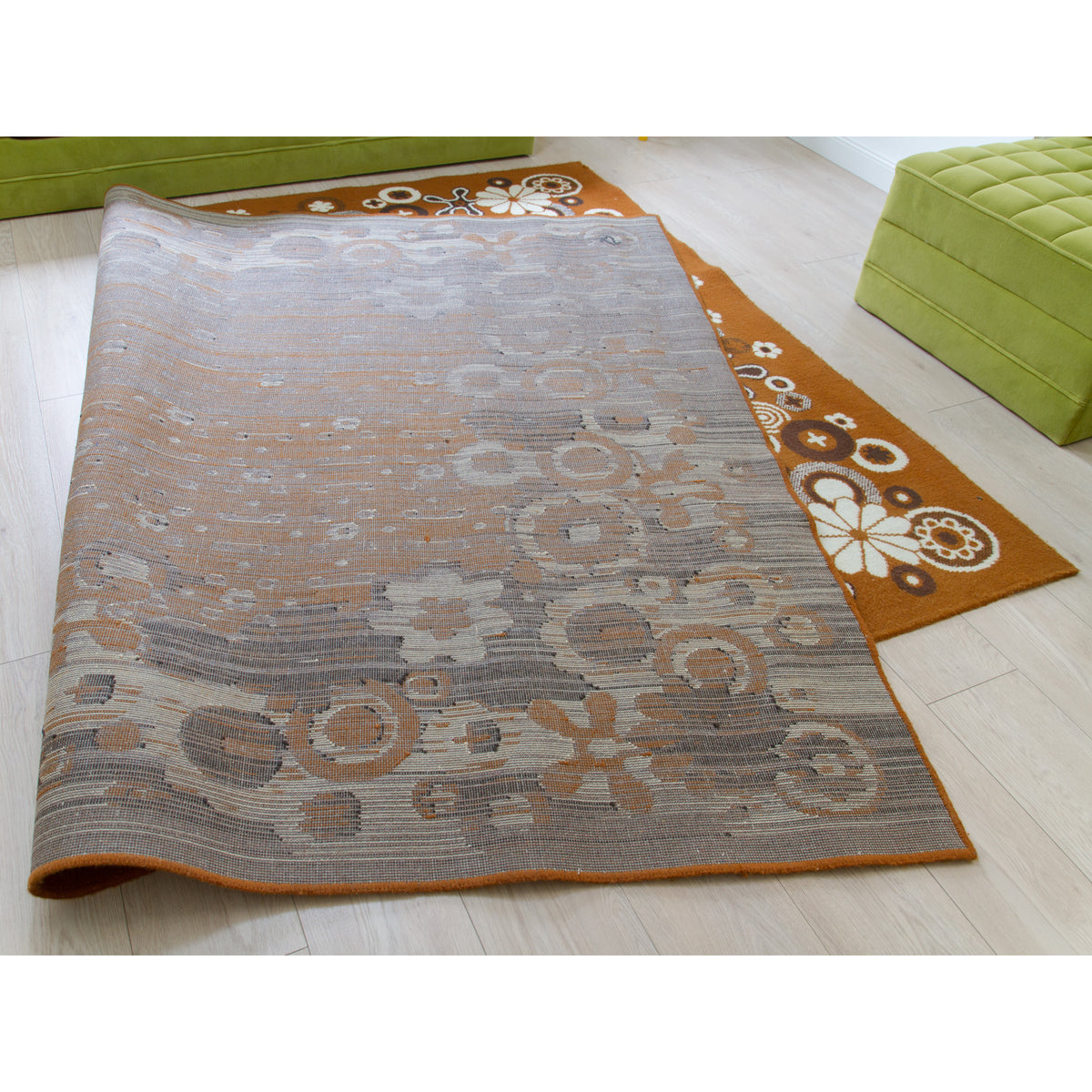 Full view of reverse side of vintage floral rug with soft grey and beige underside - clean and ready to use condition