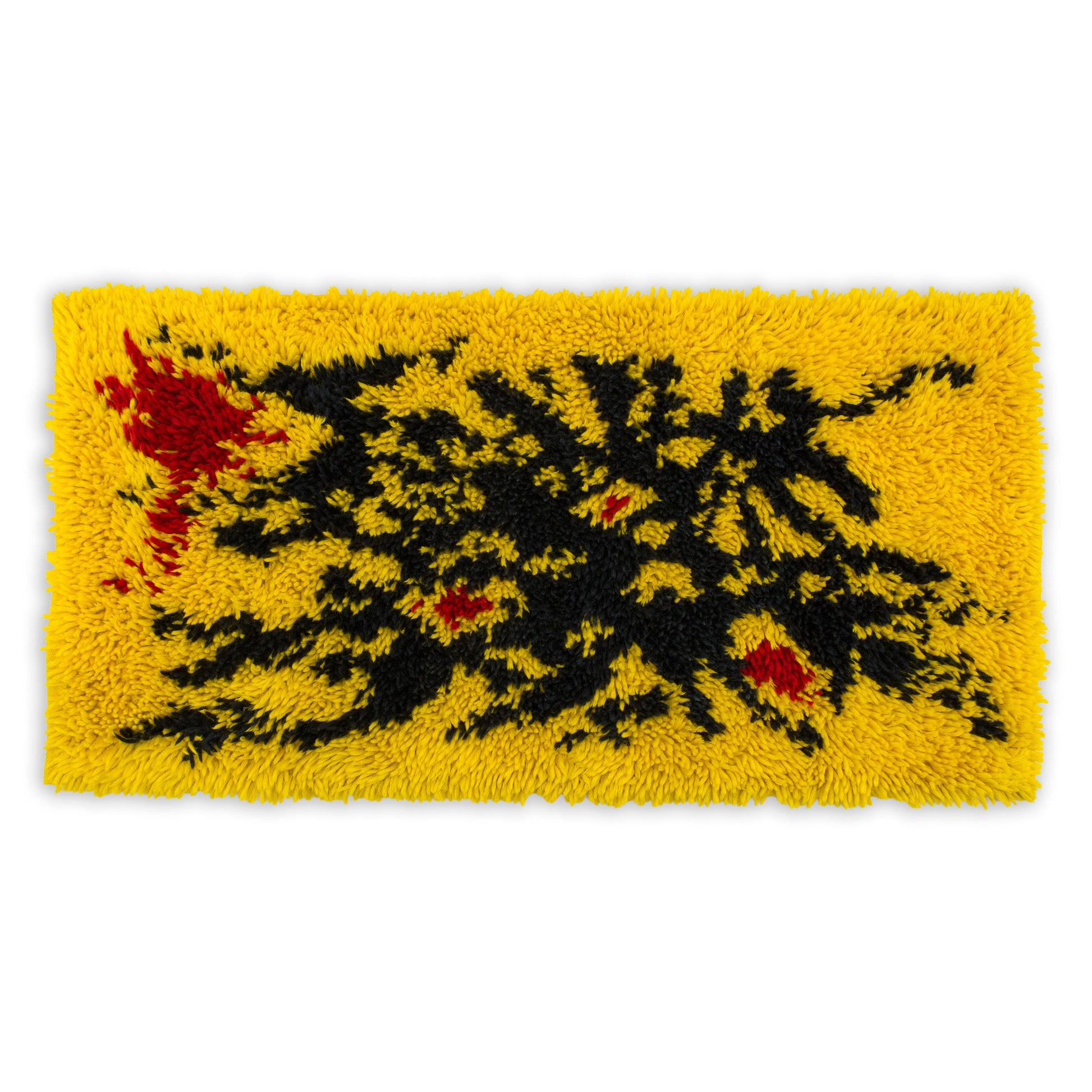 Full horizontal view of a vibrant canary yellow, black, and red vintage rya rug. Extra high pile mid century tapestry with an abstract pop art design - authentic 1970s home decor.