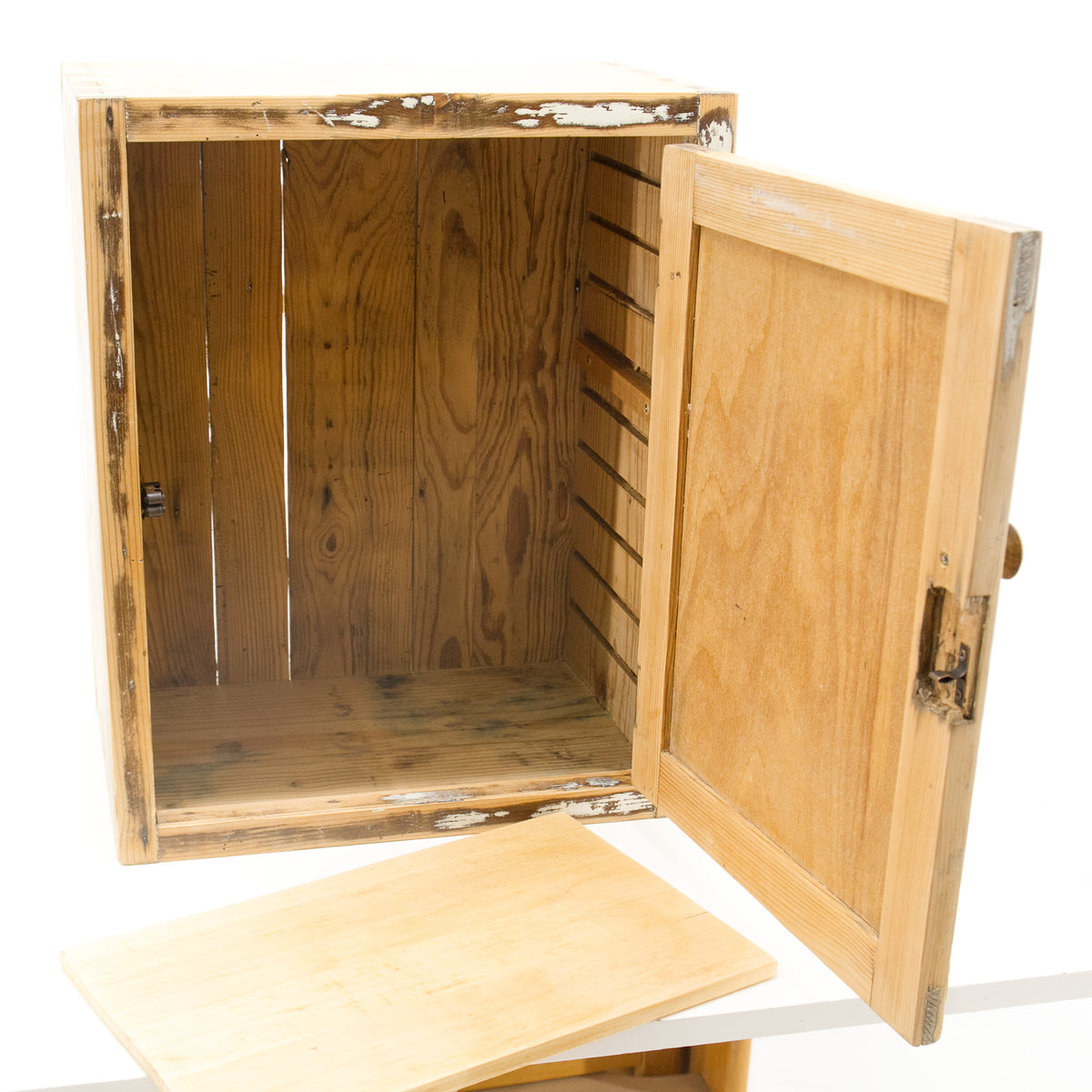 Small vintage medicine cabinet or kitchen wall storage with a slatted interior and an open door, with a removable shelf. Perfect small furniture for a rustic farmhouse or french provancal style kitchen or bathroom.