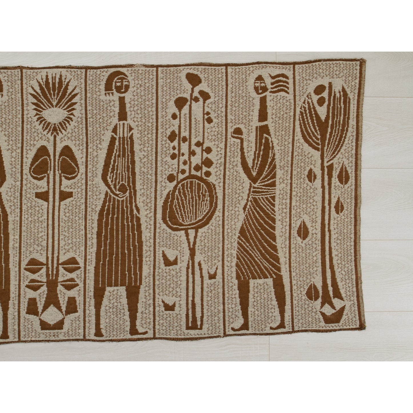 The right side of the tapestry displayed horizontally. The earthy gray tones can perfectly soften hard surfaces like raw concrete, glass, metal or hardwood.