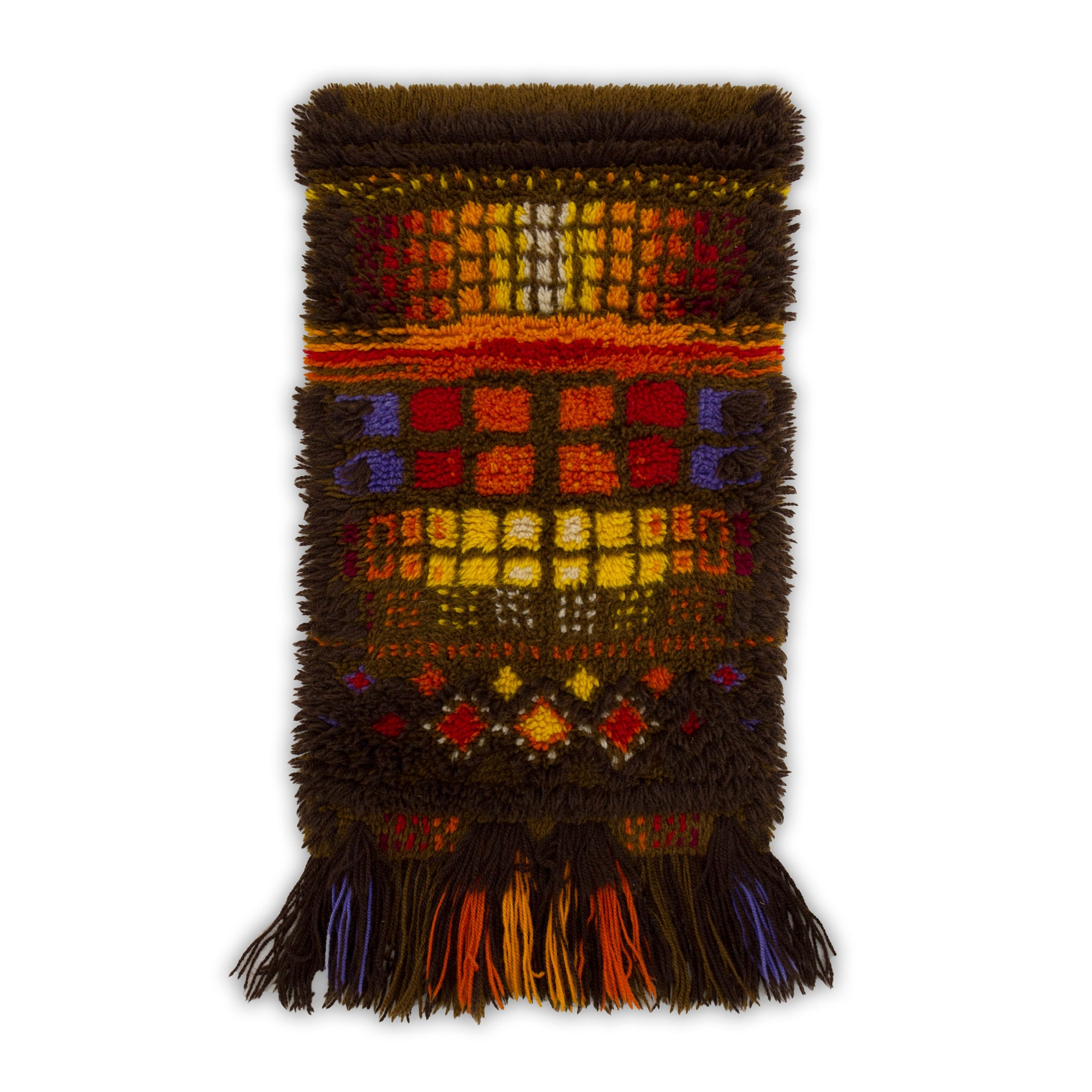 Direct flat lay isolating the entire vintage tapestry, showcasing the abstract pixelated blocks of red, yellow, and pumpkin orange against a dark chocolate brown background.